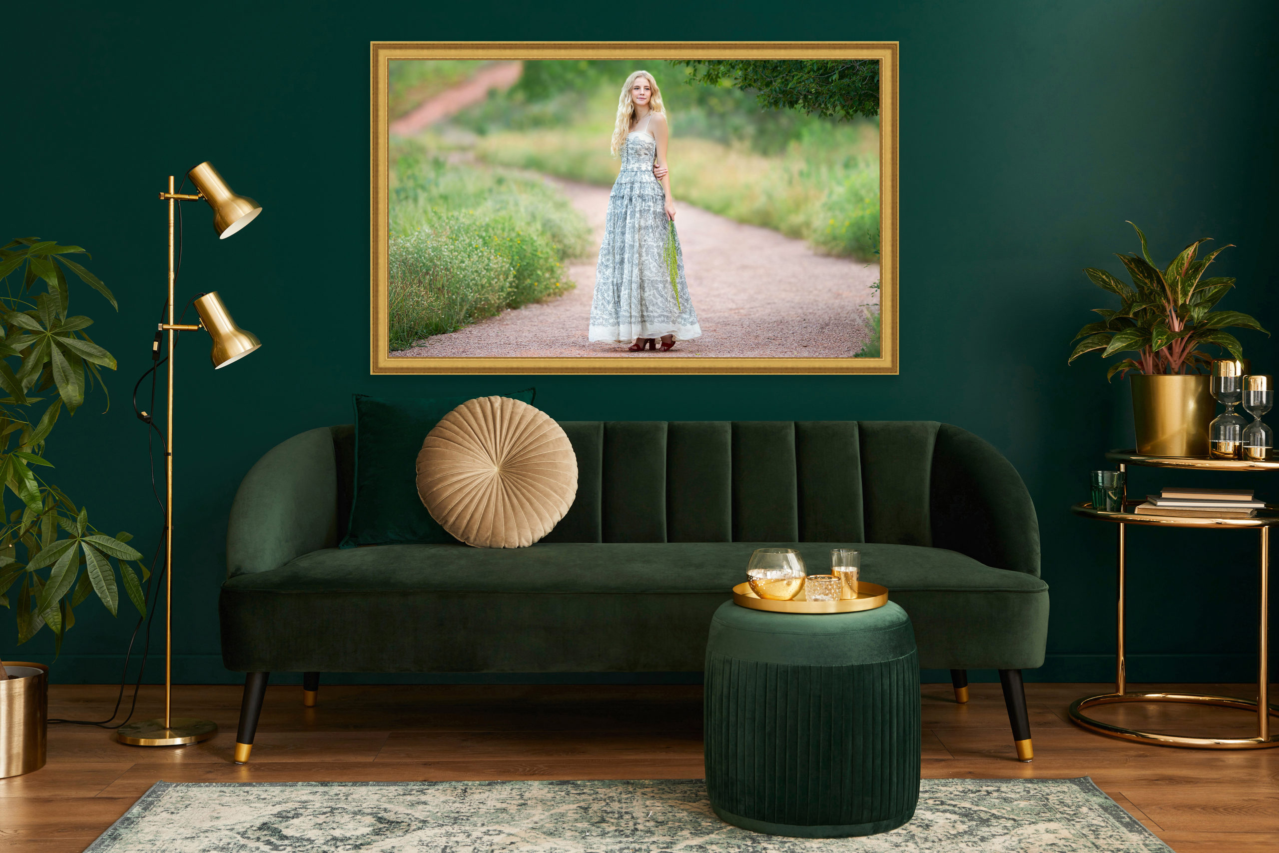 Luxury living room in house with modern interior design, green velvet sofa, coffee table, pouf, gold decoration, plant, lamp, carpet, mock up poster frame and elegant accessories. Colorado Springs Senior Modern Portraits .